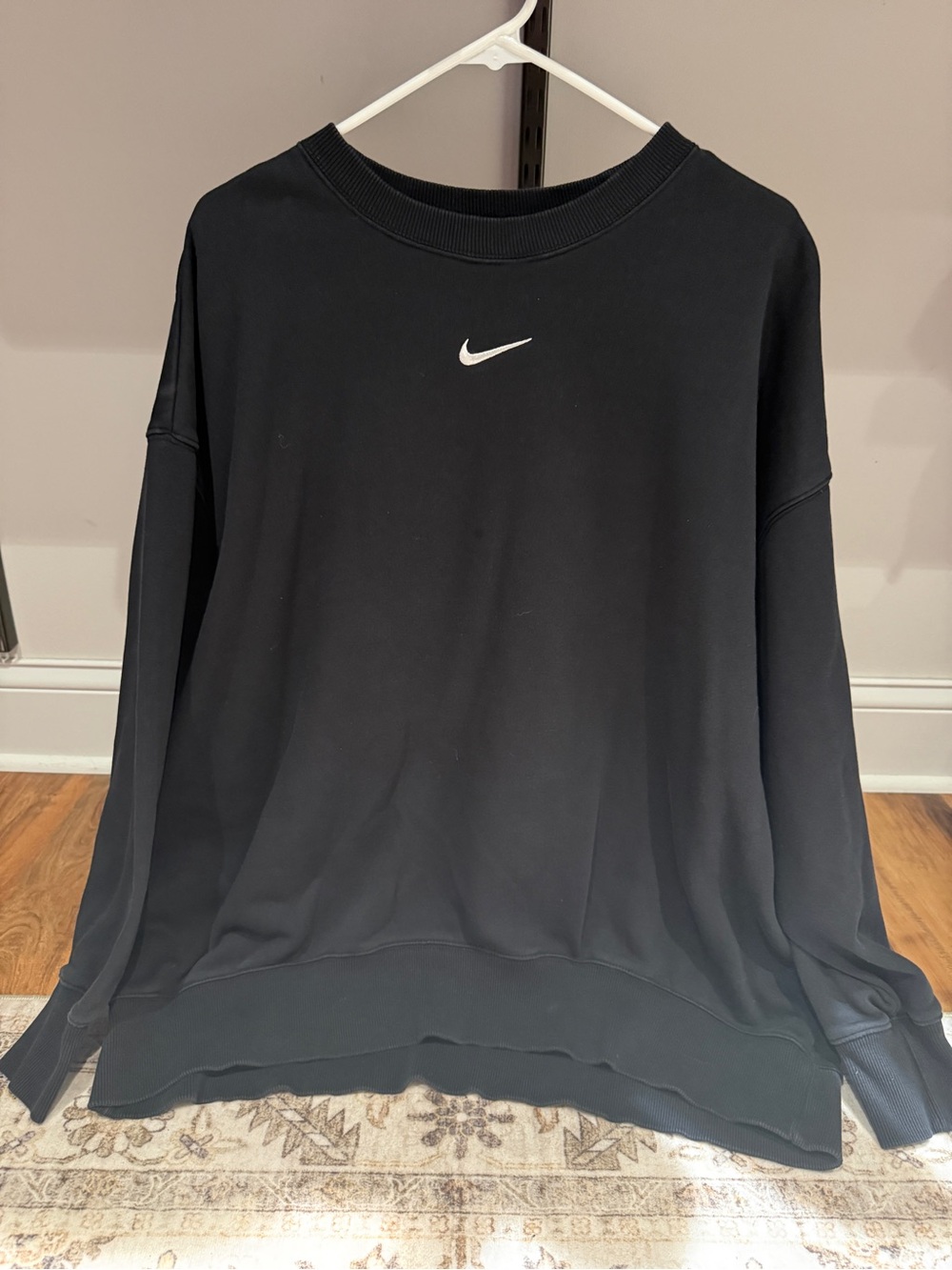 Nike Black Crewneck Sweatshirt with White Swoosh - Women’s